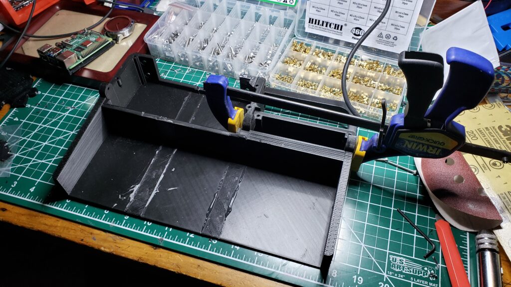Gluing the base pieces of the cyberdeck together